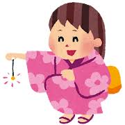 線香花火をする女の子