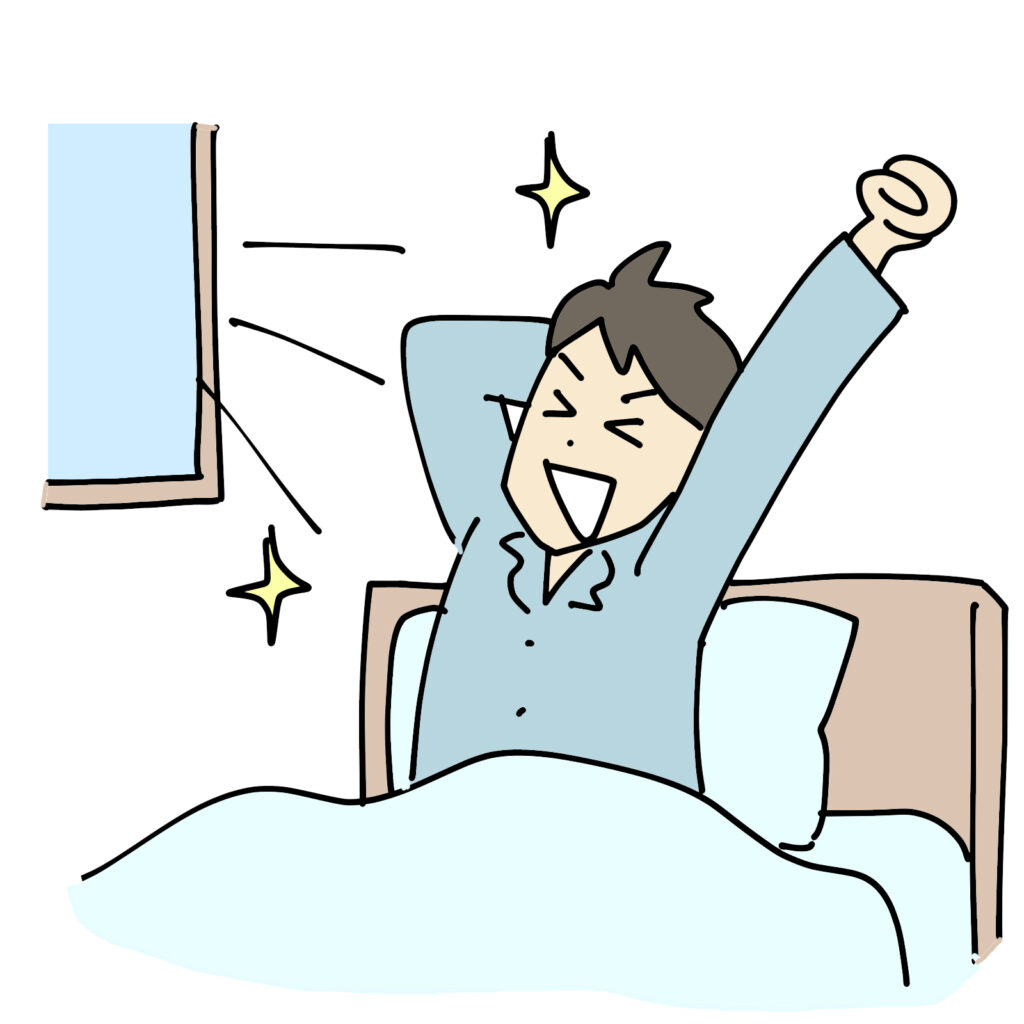 気持ちよく朝起きる男性