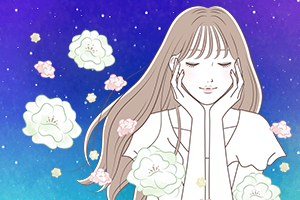 花の香りにうっとりする女性