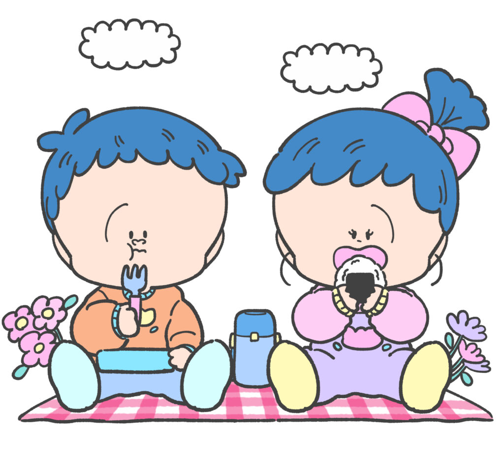 弁当を食べる男の子と女の子
