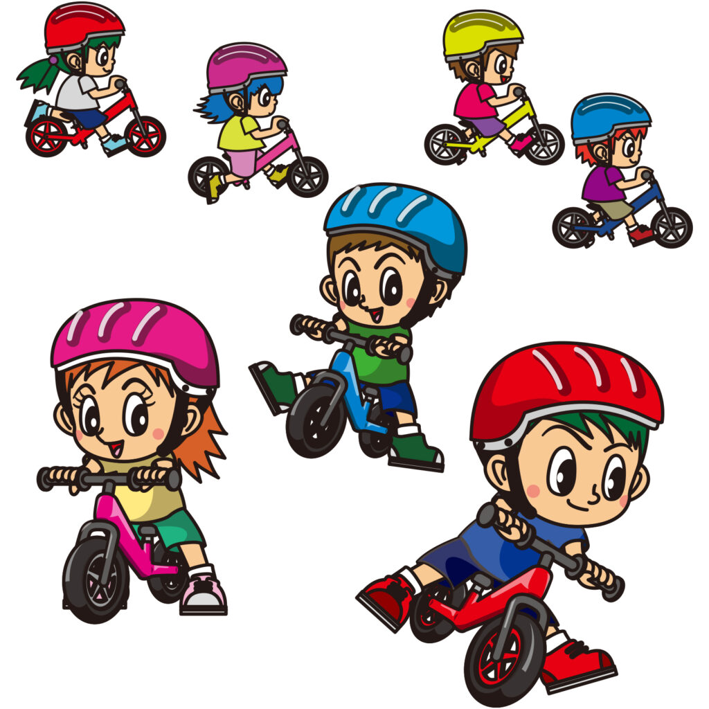キックバイクに乗る子どもたち
