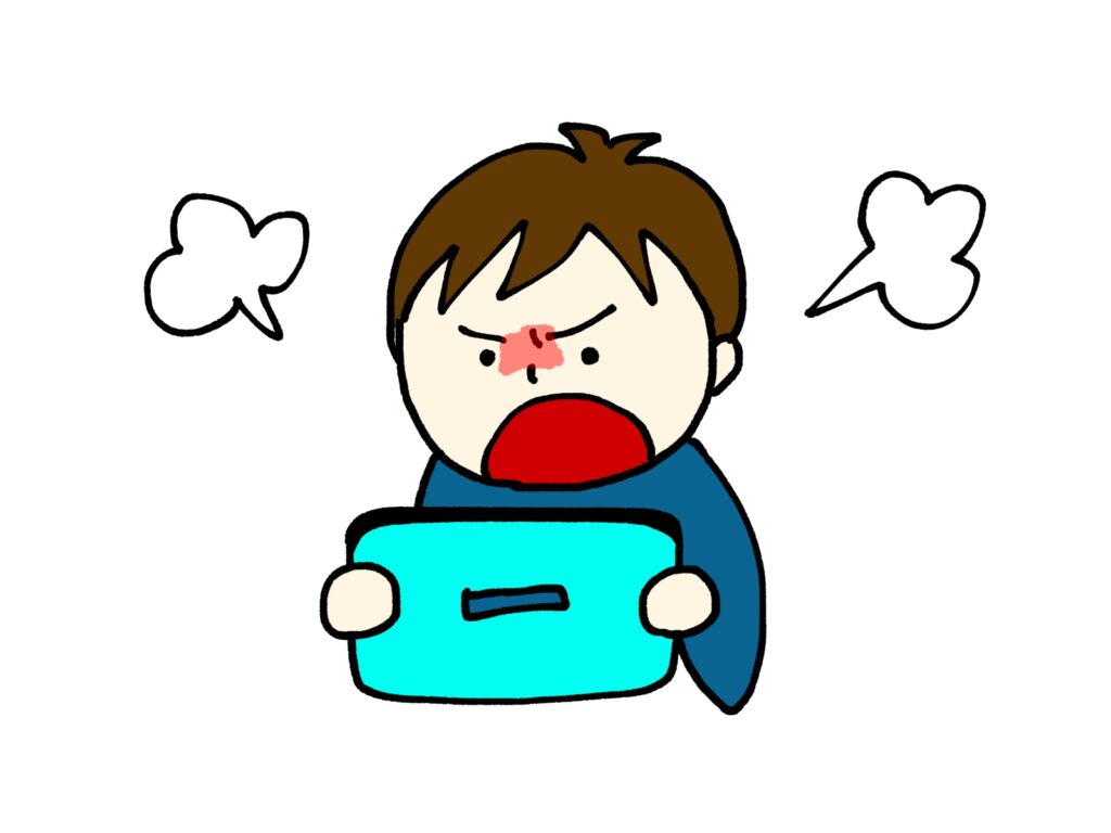 ゲームをして怒る男の子