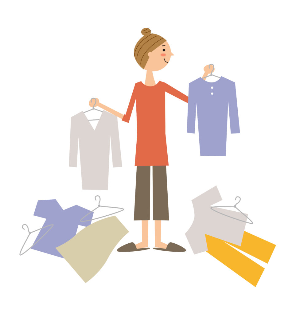 服を選んでいる女性