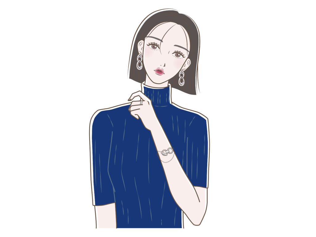 ハイネックのニットを着る女性