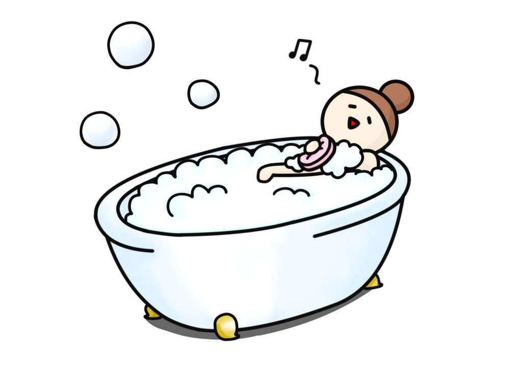 お風呂で体を洗う女性