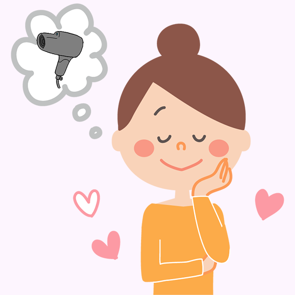 購入予定のドライヤーを想像してワクワクする女性