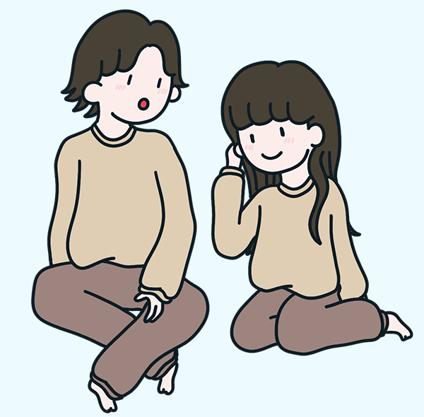 おそろいのスウェットを着たカップル