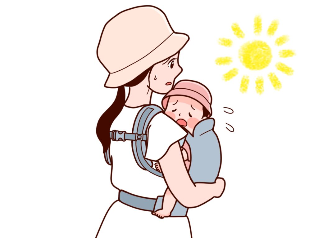 暑い夏に出かけるママと赤ちゃん