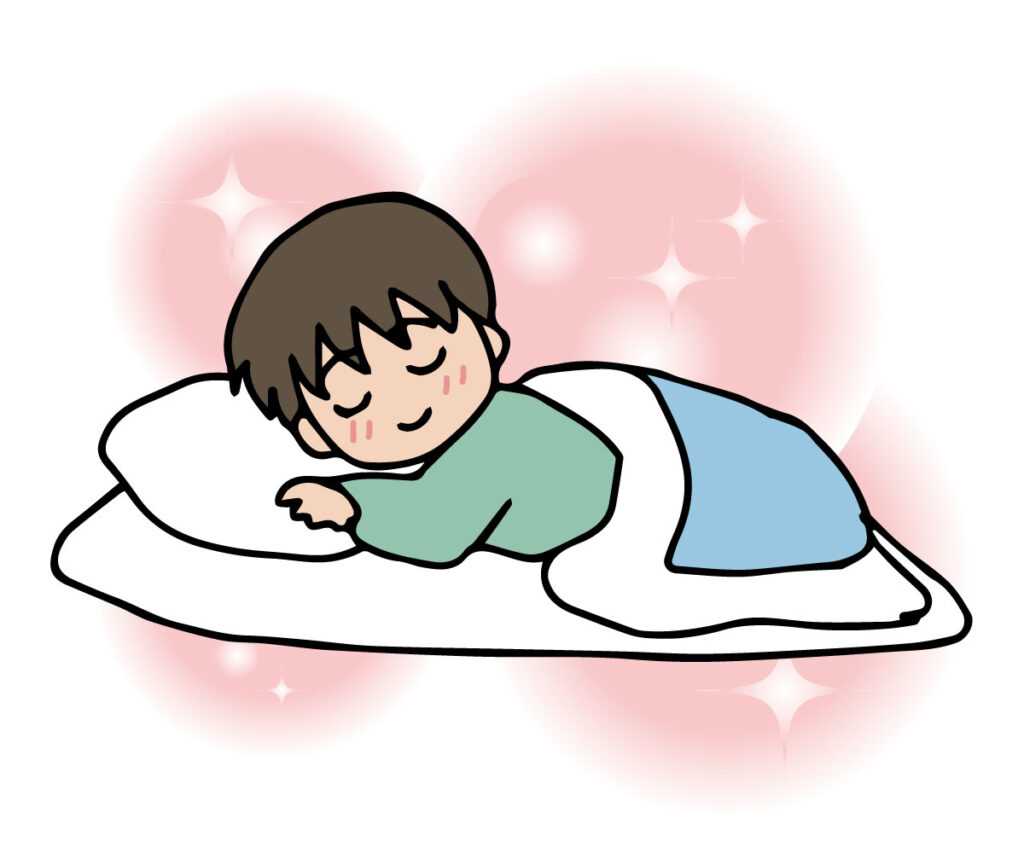 ふかふかの布団で寝る男性