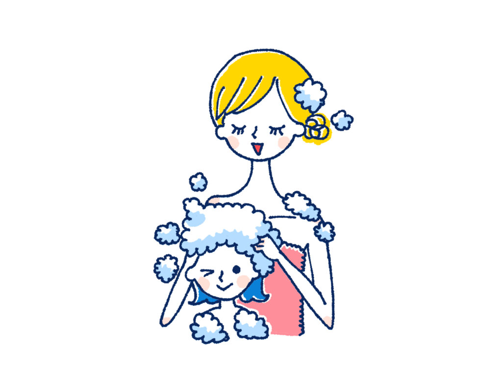 子供の頭を洗う女性
