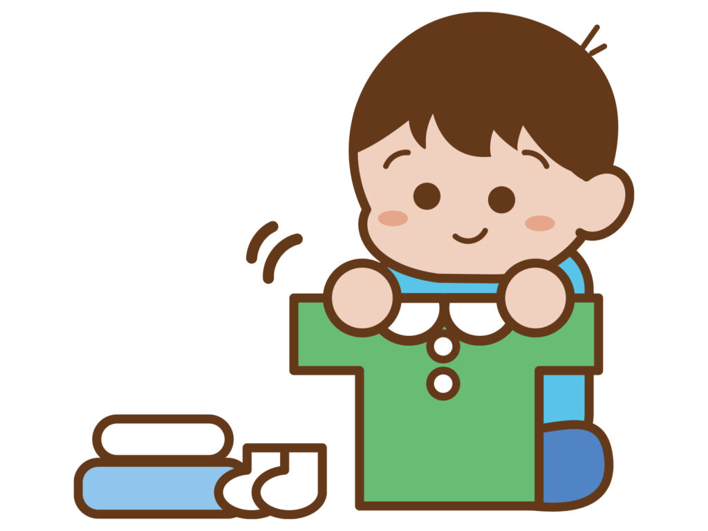 洗濯物を畳む子供