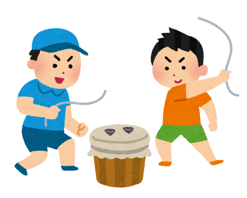 ベーゴマのバトルをする男の子たち