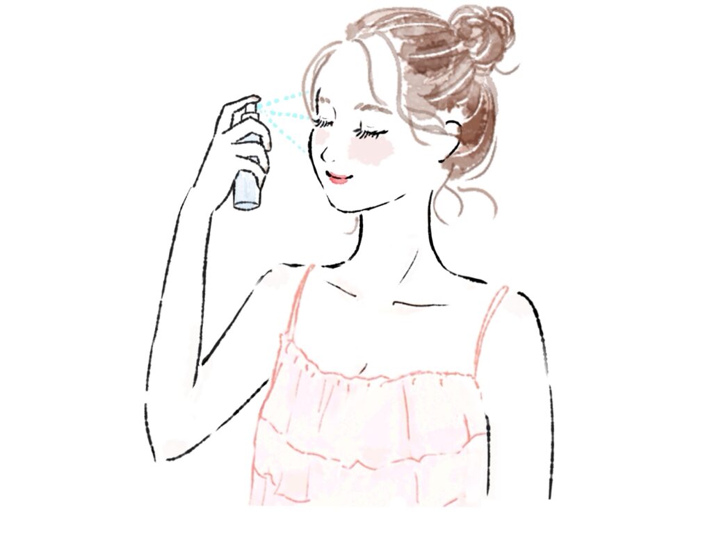 スプレーする女性