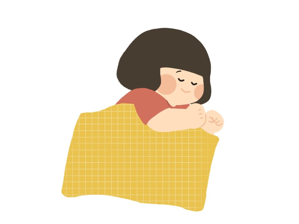 お昼寝布団で寝る女の子