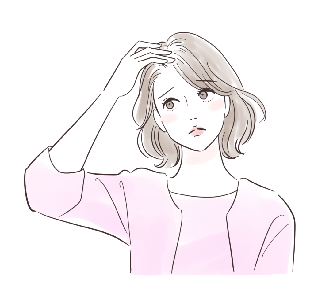 髪を気にする女性