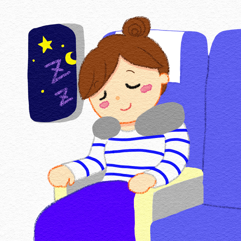 飛行機でネックピローを使う女性