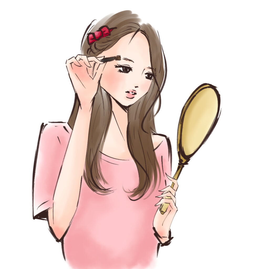 眉メイクをする女性