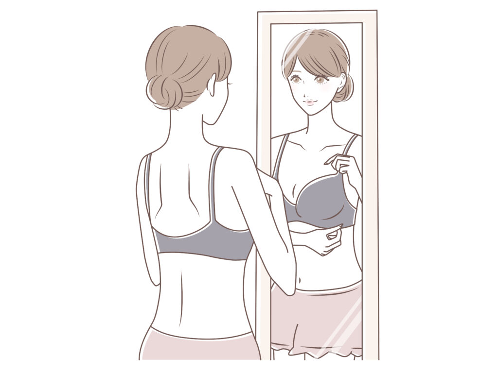 下着姿で鏡を見る女性