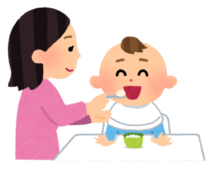 子供にご飯を食べさせる母親
